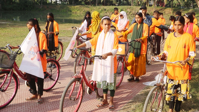 নওগাঁয় নারী নির্যাতন প্রতিরোধ পক্ষ উপলক্ষে সাইকেল র‌্যালি